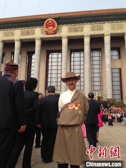 圖為2016年，尼瑪扎西出席全國政協(xié)會(huì)議(資料圖)。西藏農(nóng)科院 供圖